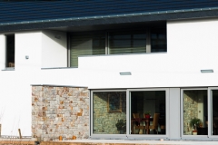construction d'une habitation - façade crépi et pierre